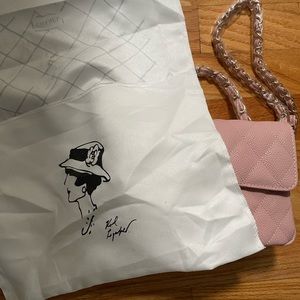 DH Gate pink cross body dupe bag